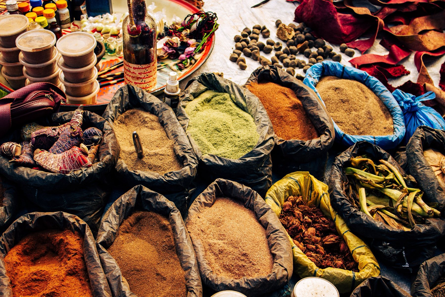 Traditional herbal medicines and remedies at an African market stall