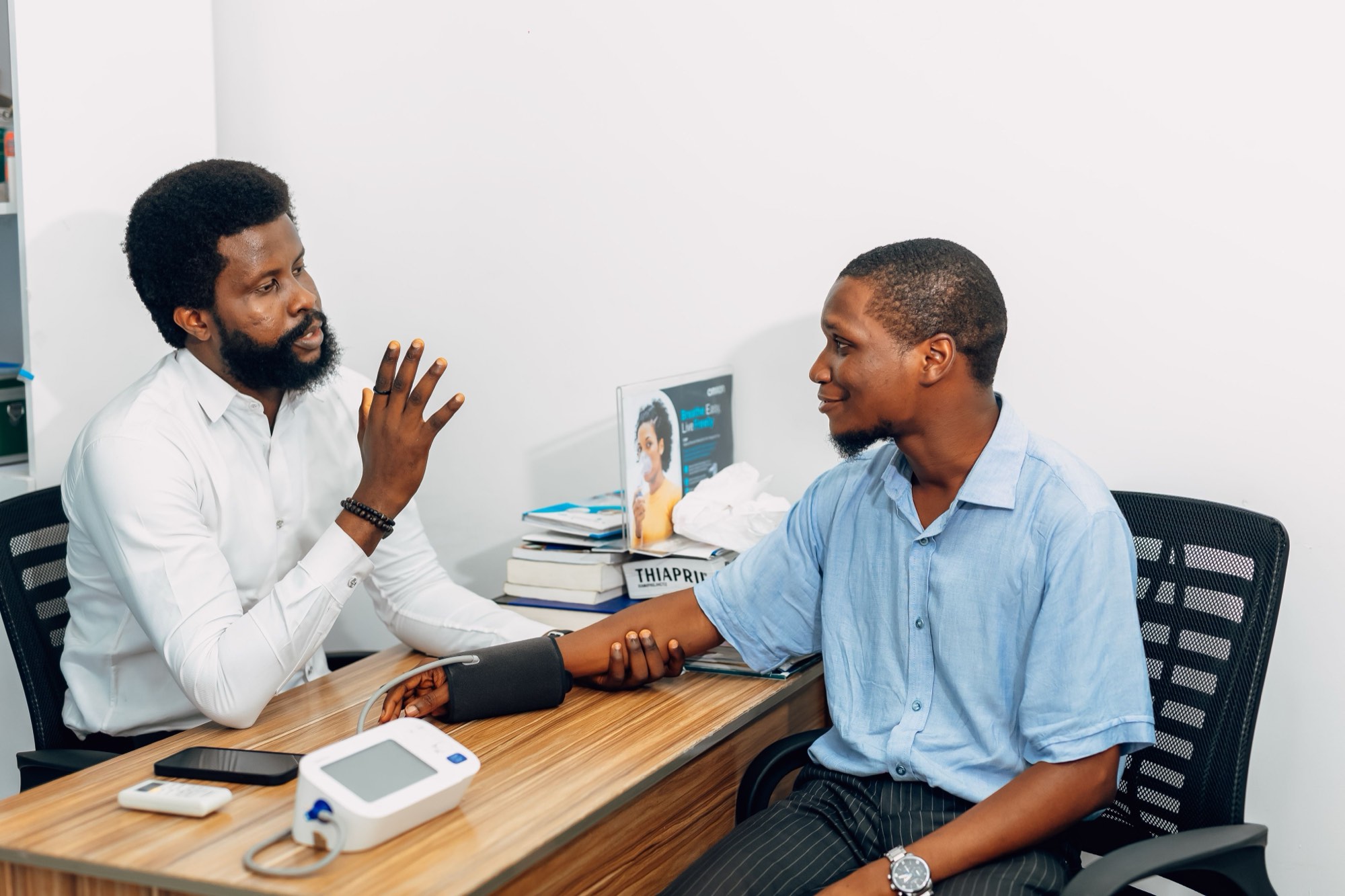 A doctor in consultation with a patient at a healthcare practice